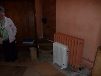 volunteer-with-portable-and-fixed-radiators